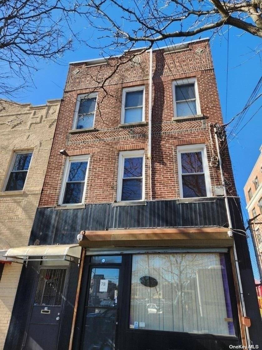 Back to the market ! Excellent Opportunity to own this Semi Detached Mixed Use Brick Building.
