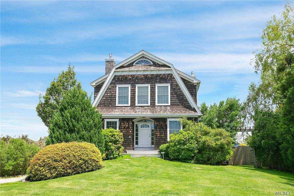 Exceptional Quogue South home, custom built in 2004, expanded in 2006, offers a light filled, spacious and contemporary interior with water views of Quantuck Bay.