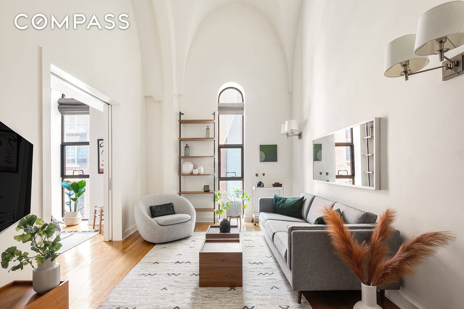 This two bedroom, two bath duplex condo is located in The Arches at Cobble Hill, a luxury landmark condominium on the former site of St.