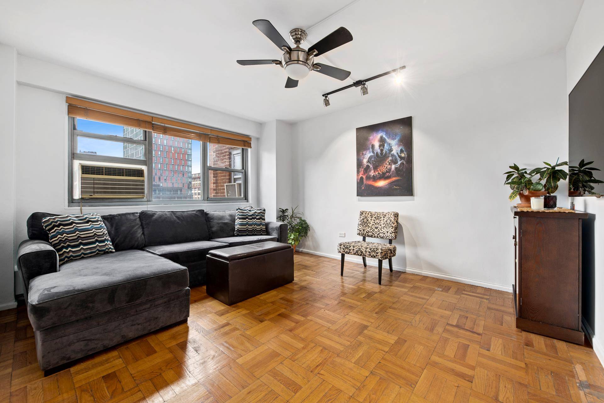 Freshly painted with new fixtures, this bright sunny, centrally located one bedroom, one bath apartment is a spacious 670 sq feet with a built in private home office, a recently ...