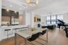 Open concept kitchen, dining, and living space