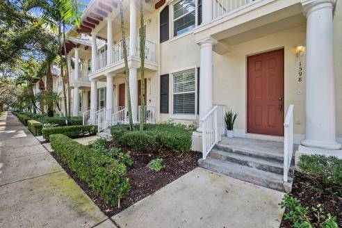 Absolutely stunning hard to find bright corner unit, 4 bedrooms, 4 bathrooms, 2163 living sqft townhouse in the heart of Abacoa in Jupiter.