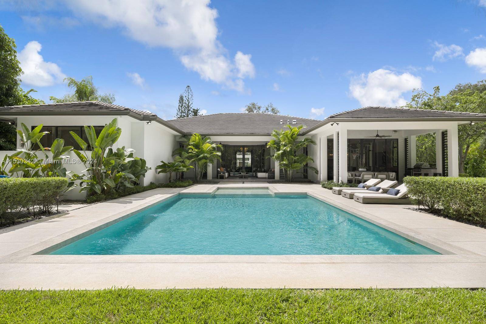 Luxury awaits in this Pinecrest modern estate, custom built in 2020 with state of the art construction and impeccable finishes.