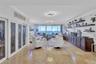 Custom closet with leaded glass crystal panels Ample shelving and storage throughout unit