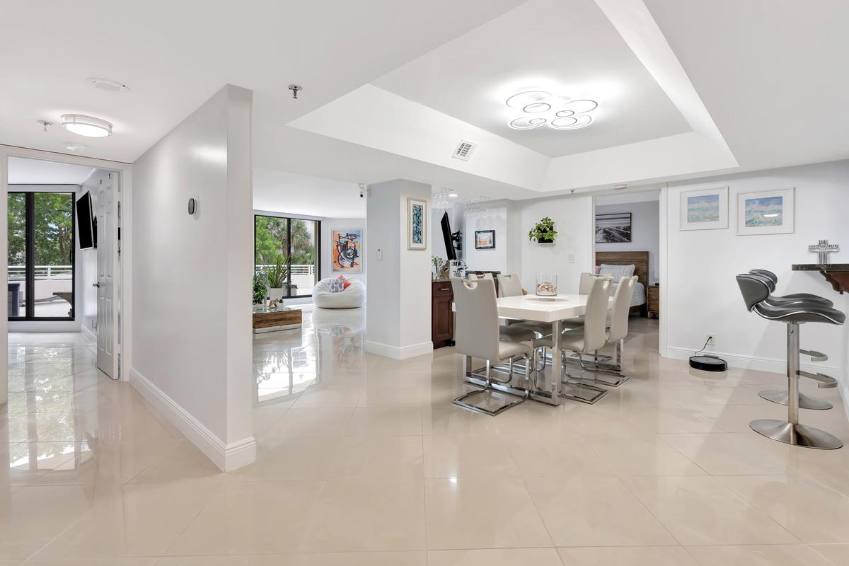 Bright spacious open- concept living and dinning area, designed for effortless entertaining and relaxed coastal living