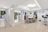 Bright spacious open- concept living and dinning area, designed for effortless entertaining and relaxed coastal living