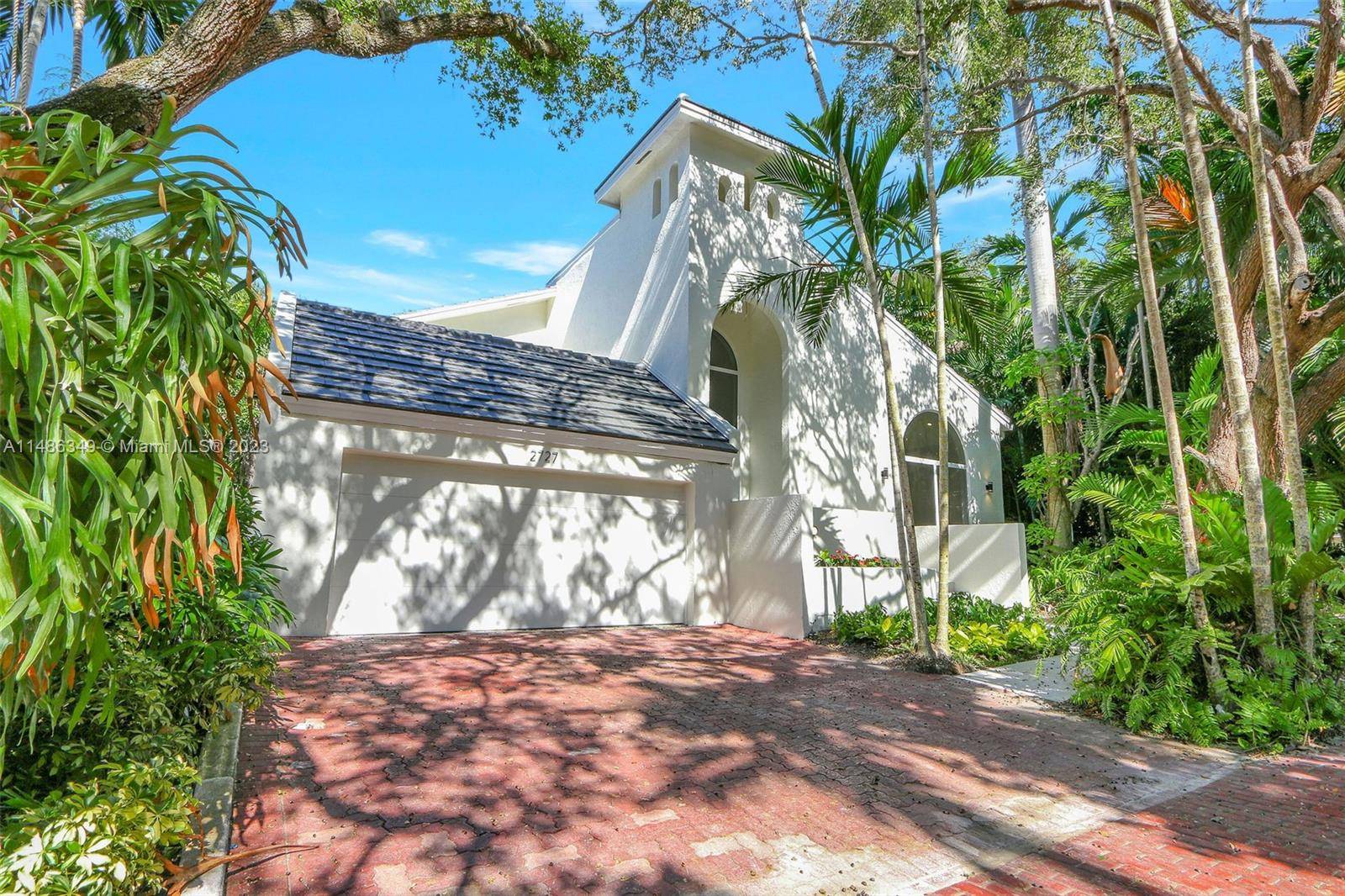Brand new renovation inside a secure gated community in a quiet corner of Coconut Grove.