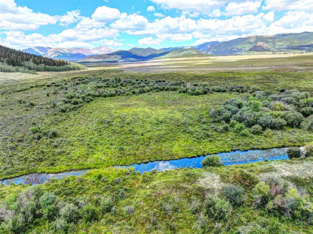 This exceptional property spans nearly 200 acres, offering breathtaking views of snow capped mountains from every angle and convenient highway access.