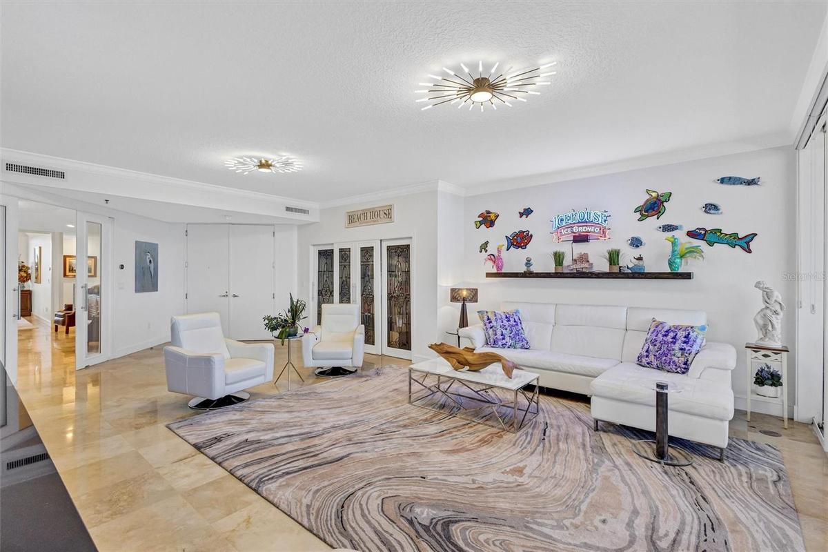 Polished travertine Stone flooring throughout the attire home