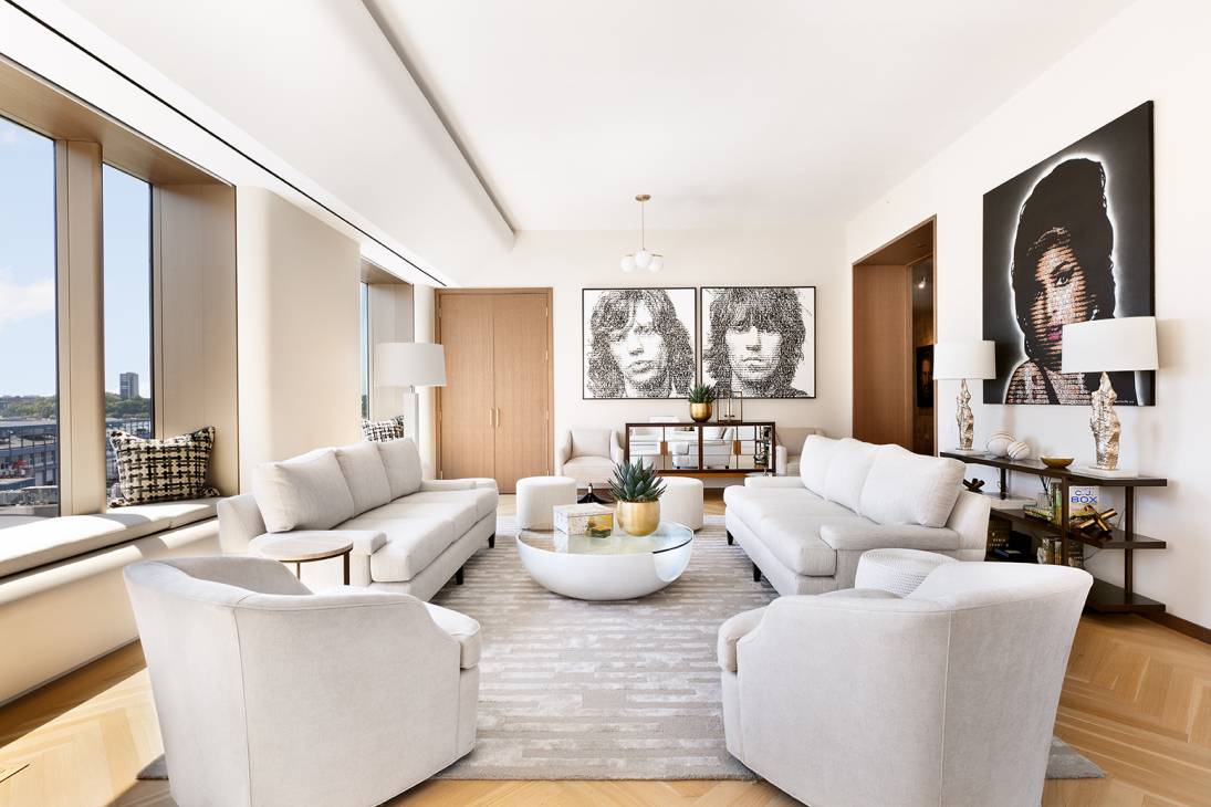 Excellent Value this spectacular, corner three bedroom, three bathroom apartment in West Chelsea's premier luxury condominium includes a valet attended private parking space.