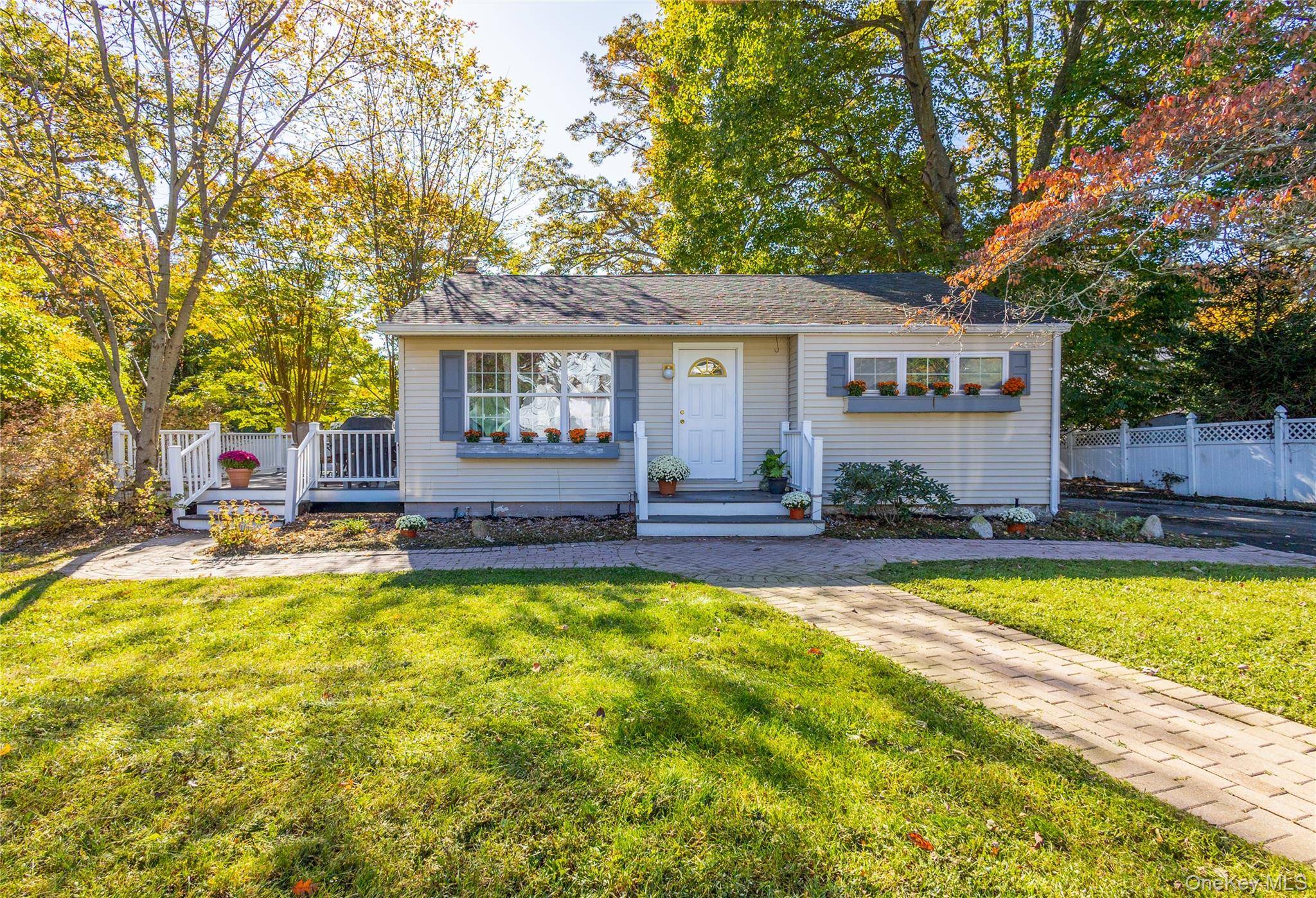 This charming two bedroom, one bathroom home sits perfectly on a large corner lot, offering both privacy and space to breathe.