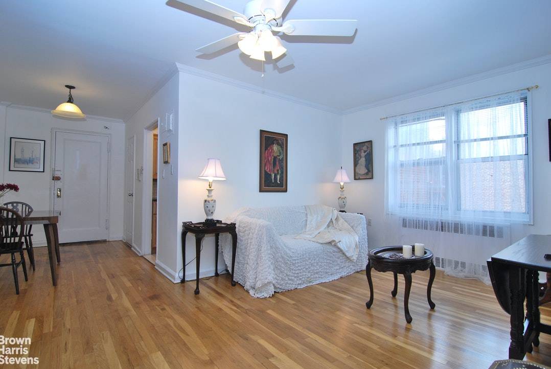 Charming 1 bedroom with separate dining area and EIK, all in the heart of Jackson Heights' Historic District.