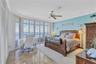 Primary Bedroom with access to the East Bay View Balcony with Plantation Shutters throughout