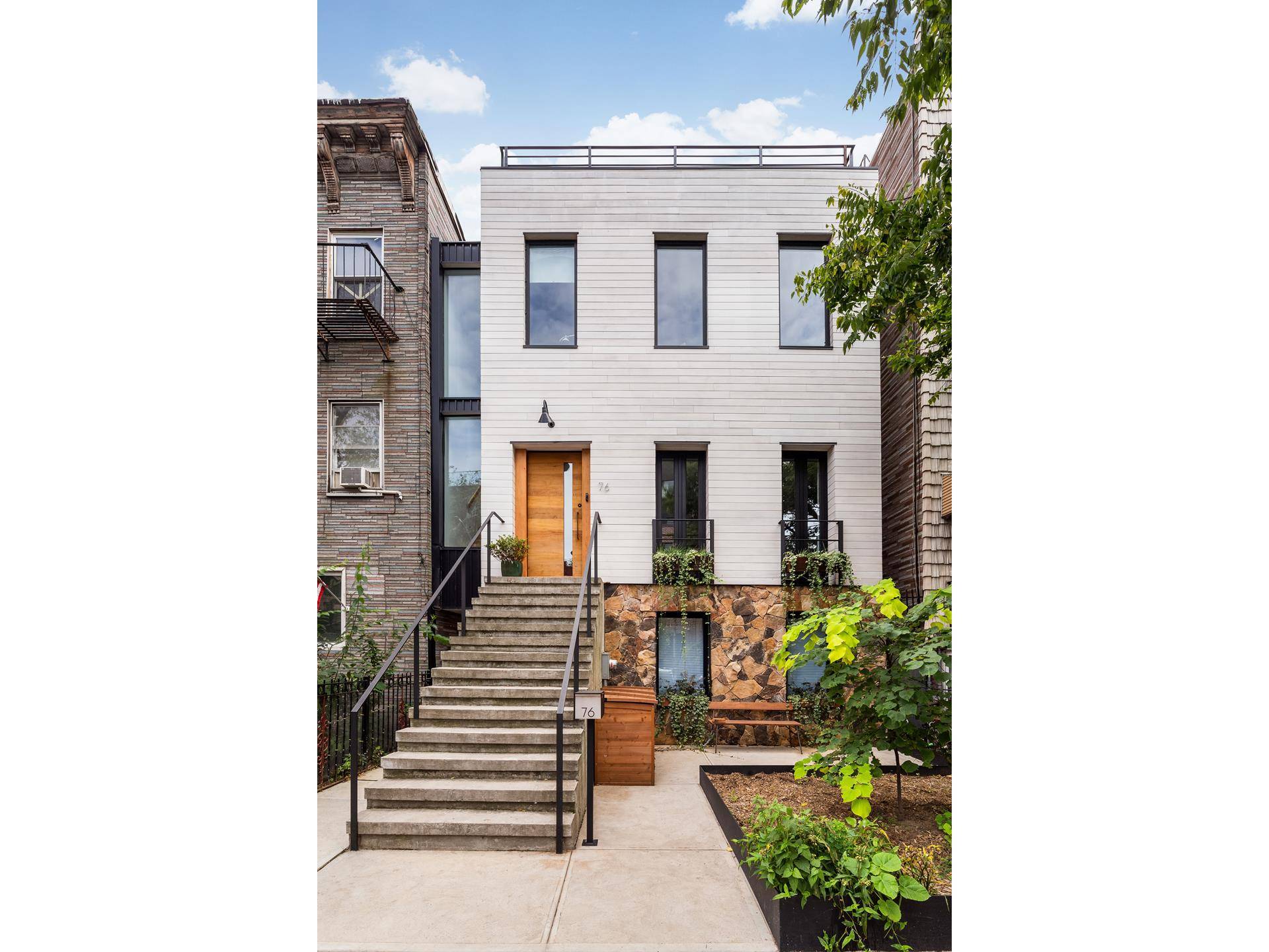 Once an 1850's sea captain's home in Greenpoint, Brooklyn, 76 Green Street is now a spectacular renovated, 2 family mid century townhouse that is breathtaking in every detail.