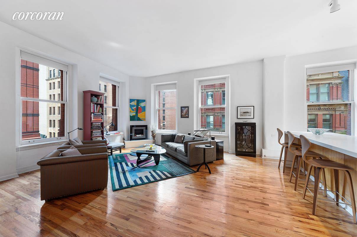 Welcome to this expansive loft located at the charming landmarked Potter Building.