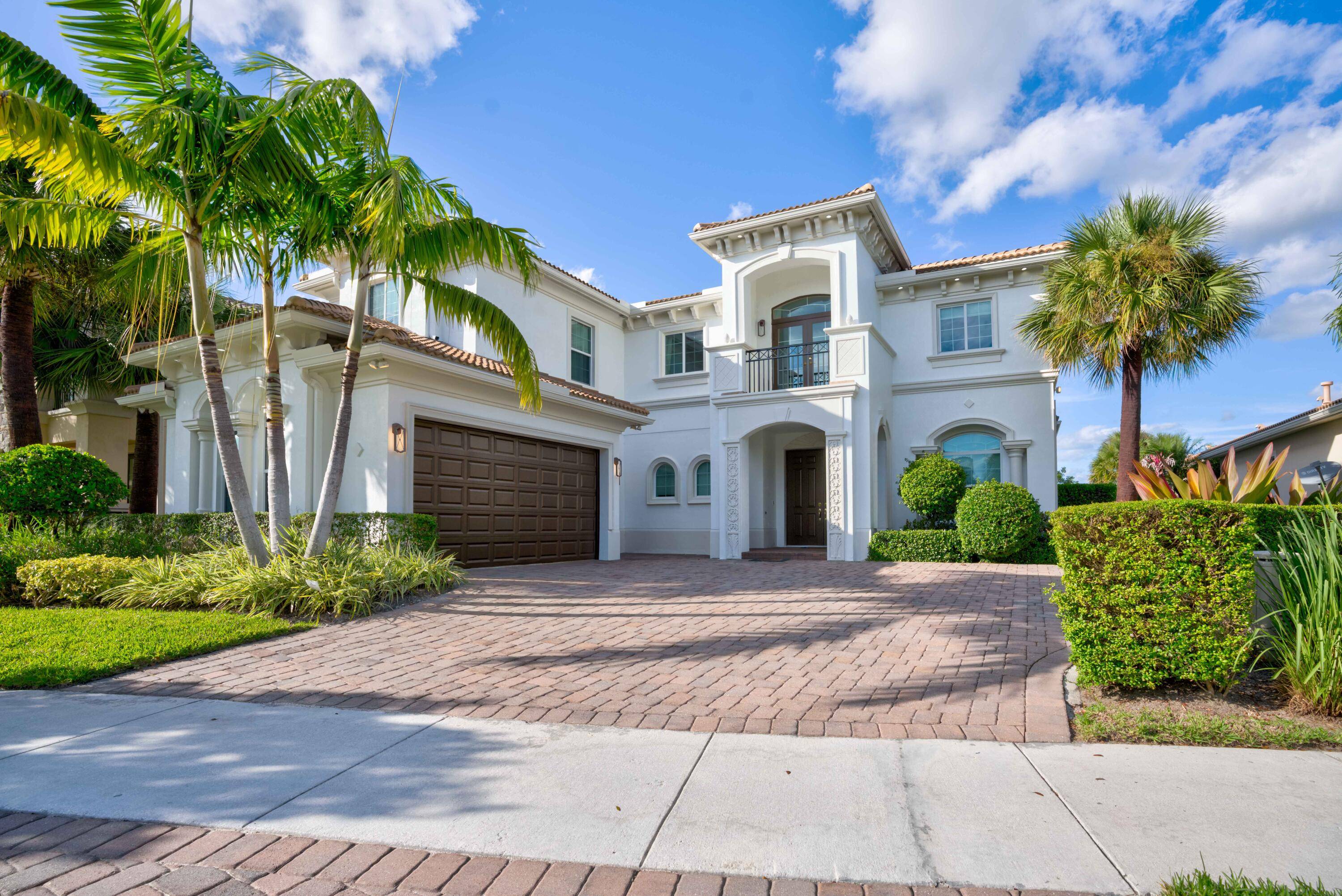 Spectacular Expanded Carina model w stunning views of the 16th hole Fairway in the exclusive community of Jupiter Country Club.