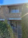 View of front of house featuring brick siding