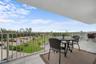 Large terrace overlooks beautfully landscaped grounds