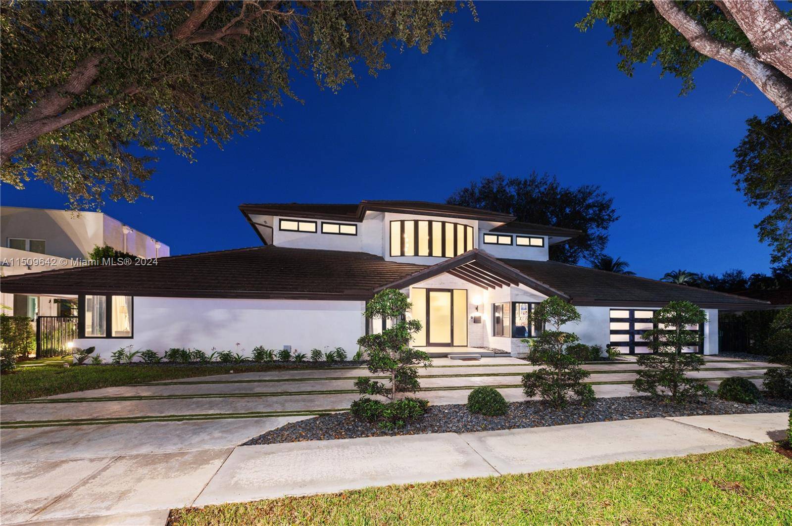 Discover unrivaled luxury at 16020 E Troon Circle in Miami Lakes' Loch Lomond.