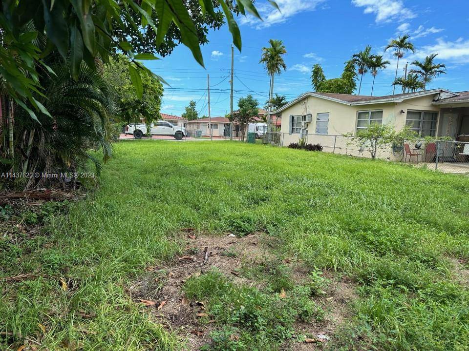 Beautiful lot in central location, plans for a Single Family 3 2 1600 sf living area the plans and master permit has been approved for the city, plans are included ...
