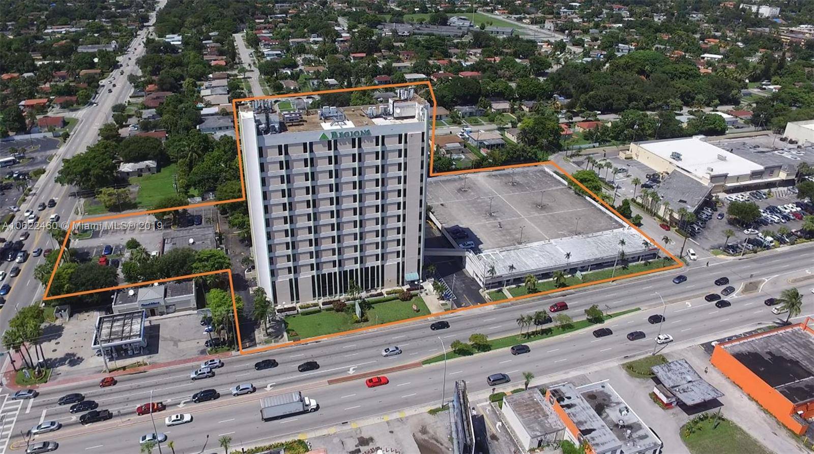 Currently, the 2. 9 acre redevelopment site contains a twelve story office building, a one story retail shopping strip center, a two level parking garage, and a free standing one ...