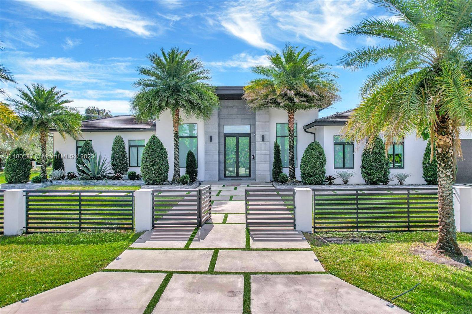Indulge in luxury in this contemporary Davie estate, near top schools, organic markets, and restaurants, with easy highway access.