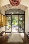 Entryway featuring healthy amount of natural light and hardwood / wood-style flooring