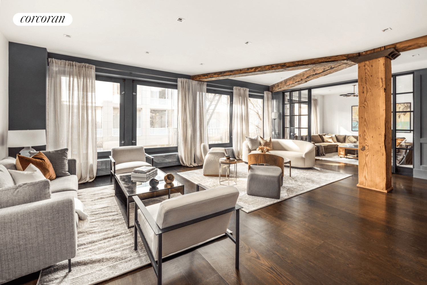 Magnificently renovated SoHo loft with incredible 40 feet of windows over looking iconic cobblestoned Wooster Street.