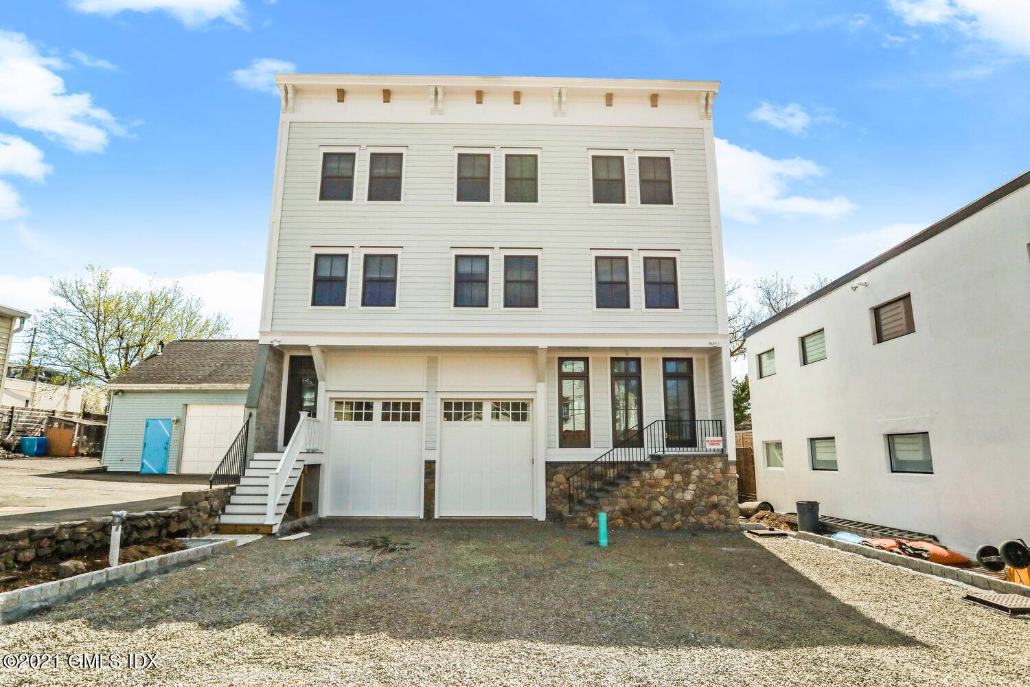 Gorgeous new construction on a cul de sac in downtown Byram with views of the Byram River.