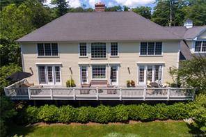 This stunning Colonial, constructed in 2007, is perfectly sited on 1.