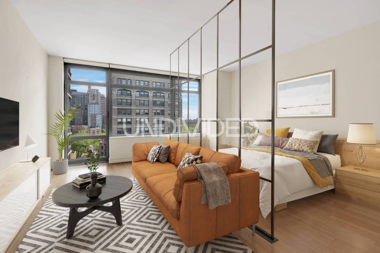 Apartment 10B at 303 E 33rd Street is a rare alcove studio with crisp modern interiors warmed by bamboo floors throughout.