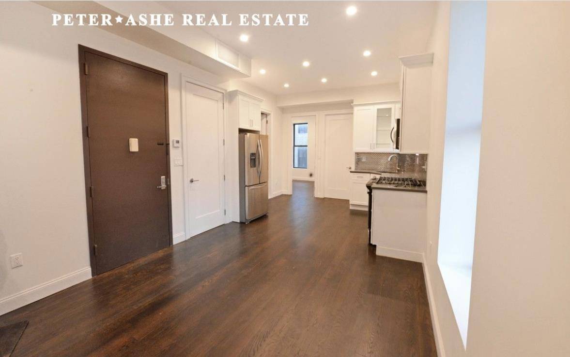 Approx 1, 200 square foot 3 bedroom, 2 full bathroom floor through apartment in a brownstone with open kitchen and Whirlpool appliances.