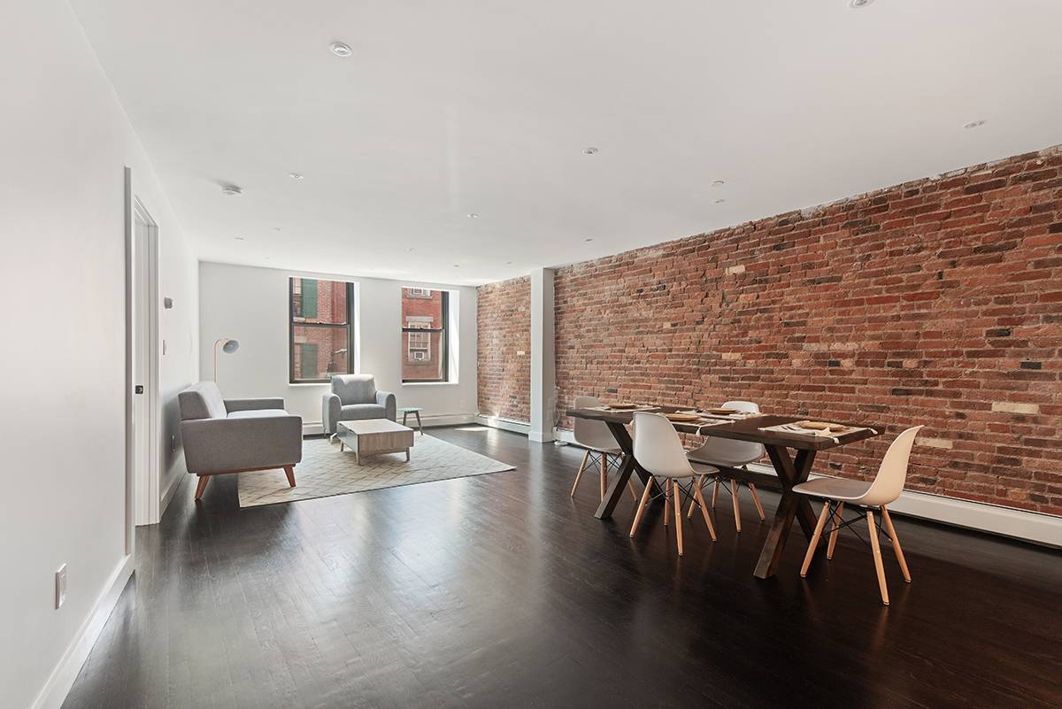 Welcome home to this newly renovated southeast facing 2br 2ba condominium in the heart of the Lower Manhattan's cobblestoned Historic Seaport District.