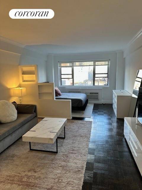 Fully Furnished Unobstructed, beautiful views in this newly renovated large open loft like living space in a full service luxury high rise with an unbeatable Upper East Side location !