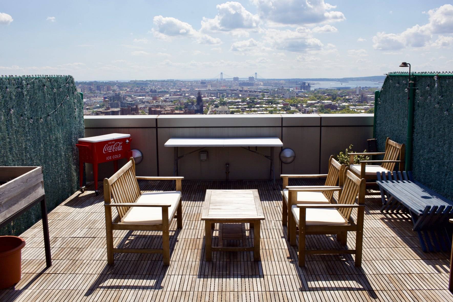 A spectacular corner 2 bedroom 2 bath condo with breathtaking views of Brooklyn and a private rooftop cabana extra 200 mo !