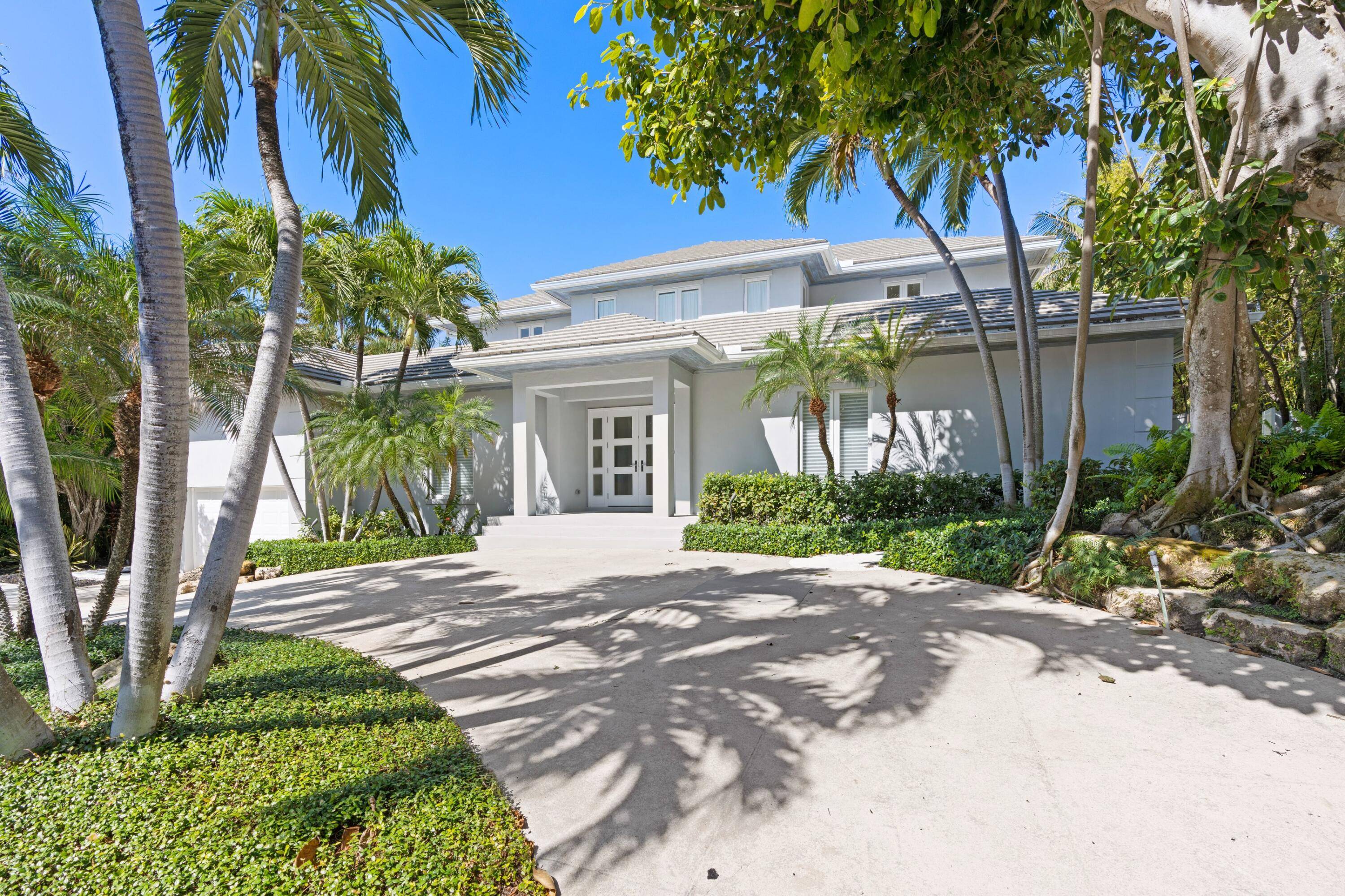 Located just four properties from the ocean, this Mid Century Modern home comprises a 5 bedroom main house and a two story guest house on a generous 14, 810 SF ...