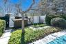 To the circular driveway and front yard from pool with private gate