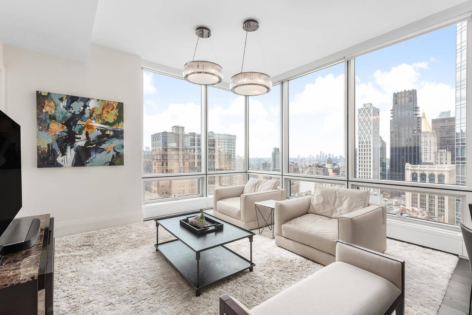 Enjoy Manhattan city views from various exposures in this 2, 146 square foot, three bedroom, three and a half bathroom corner residence with soaring ceilings, amongst the highest in the ...