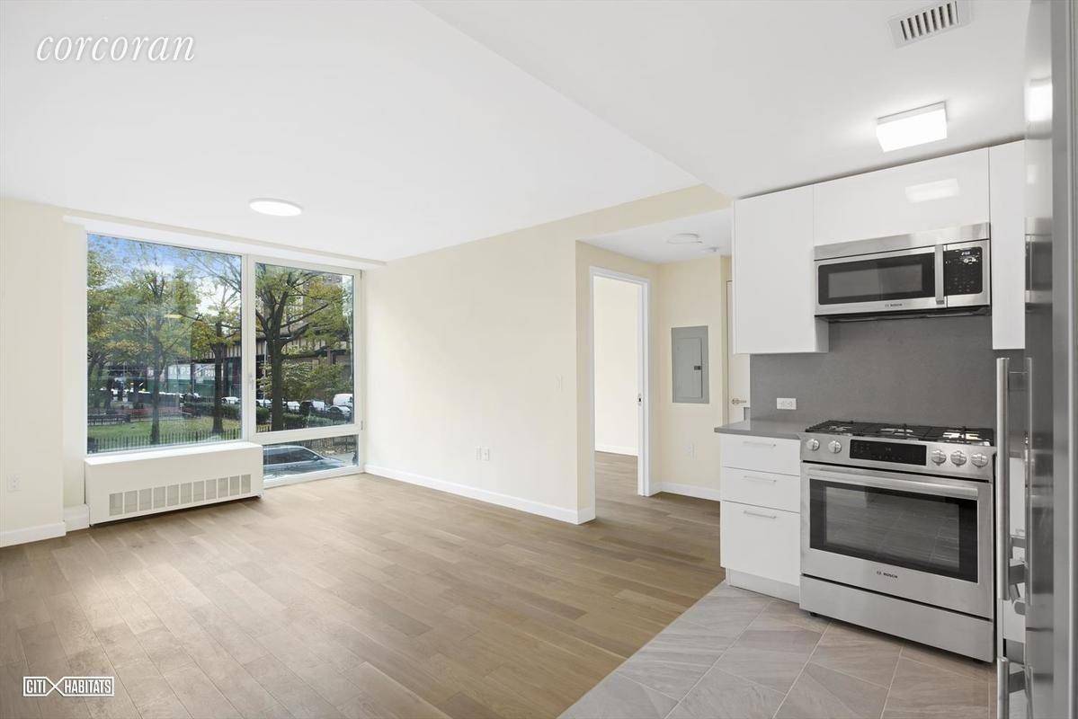 A sunny, south facing 1BR with a W D in a new development.