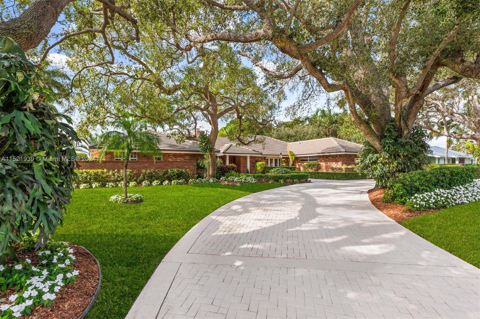 Beautifully appointed waterfront home on the desirable Delray Boynton line and over 150 feet of water frontage.
