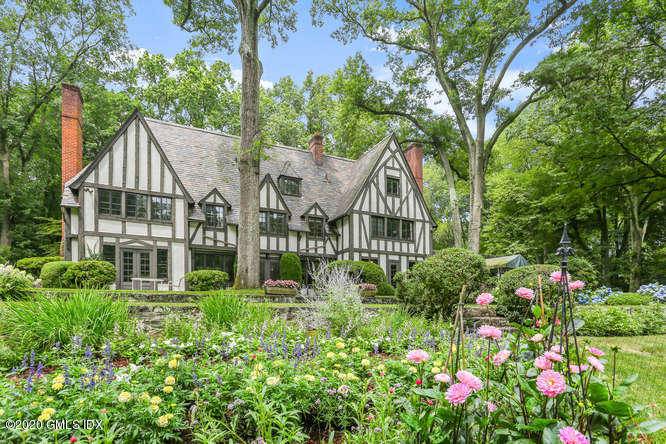 One of a kind estate on nearly 8 acres in 2 acre zone under one hour to New York City.