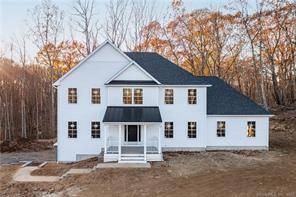 Beautiful new construction set on 2 acres backed by open space.