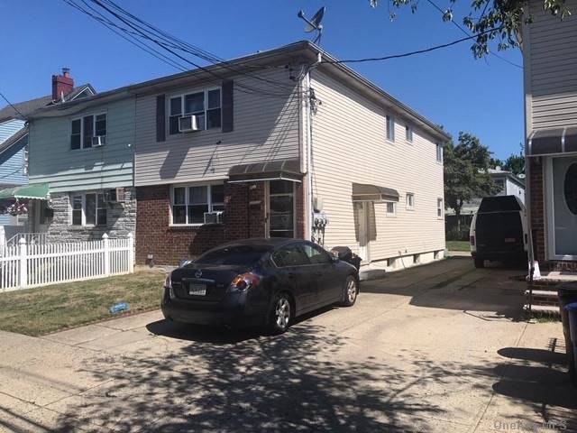 1st floor 2 bedroom unit Month to Month only close to LIRR, Buses, Schools, Cross Island Parkway, Shopping.