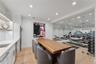 Dining space with recessed lighting and light wood-style flooring