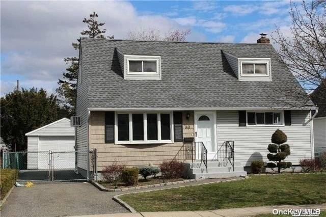 Expanded Cape W 4 Bedrooms, 2 Updated Baths And Updated Kitchen W Granite Counters, Gas Cooking amp ; Heat, Gleaming Hardwood Floors, Hi Hats, New AC Unit, Finished Basement, Washer ...