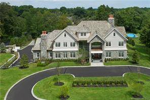 Spectacular, NEW CONSTRUCTION 14, 000sf estate sited on 2 1 2 acres includes 12, 000sf living space plus a 2, 300sf detached, 2 story, heated and air conditioned barn, a ...