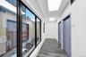 Hallway featuring wood finished floors