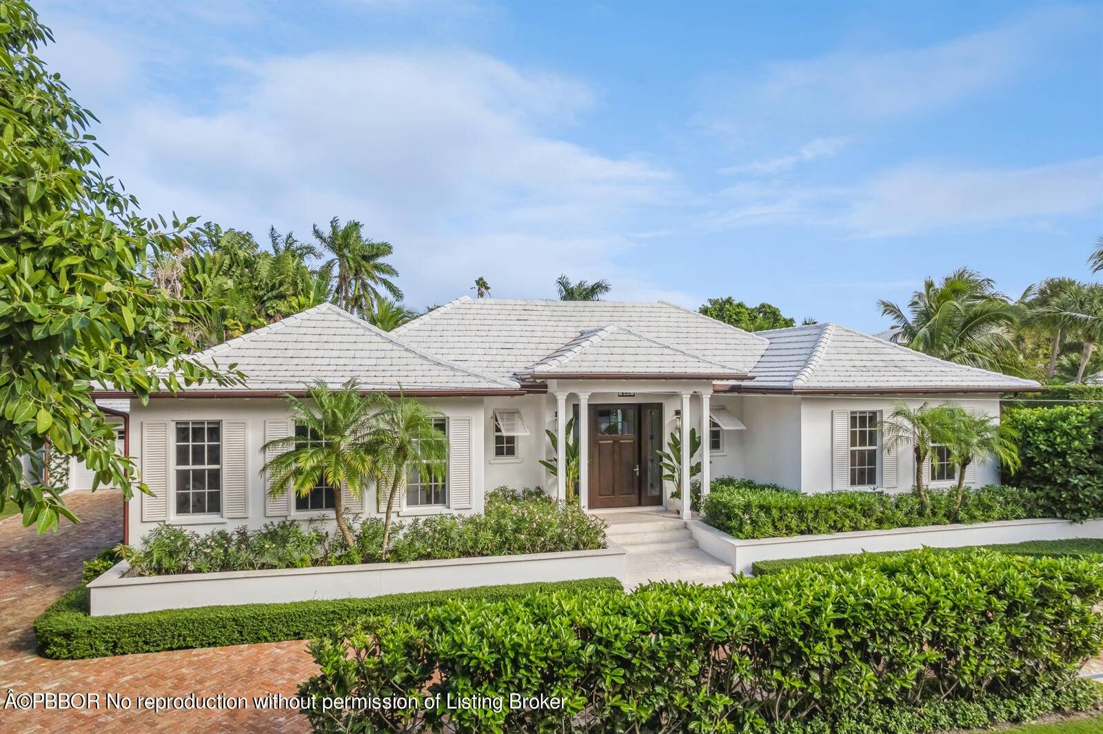 Experience luxurious living in the heart of Palm Beach with this exquisite 2022 construction, single story residence.
