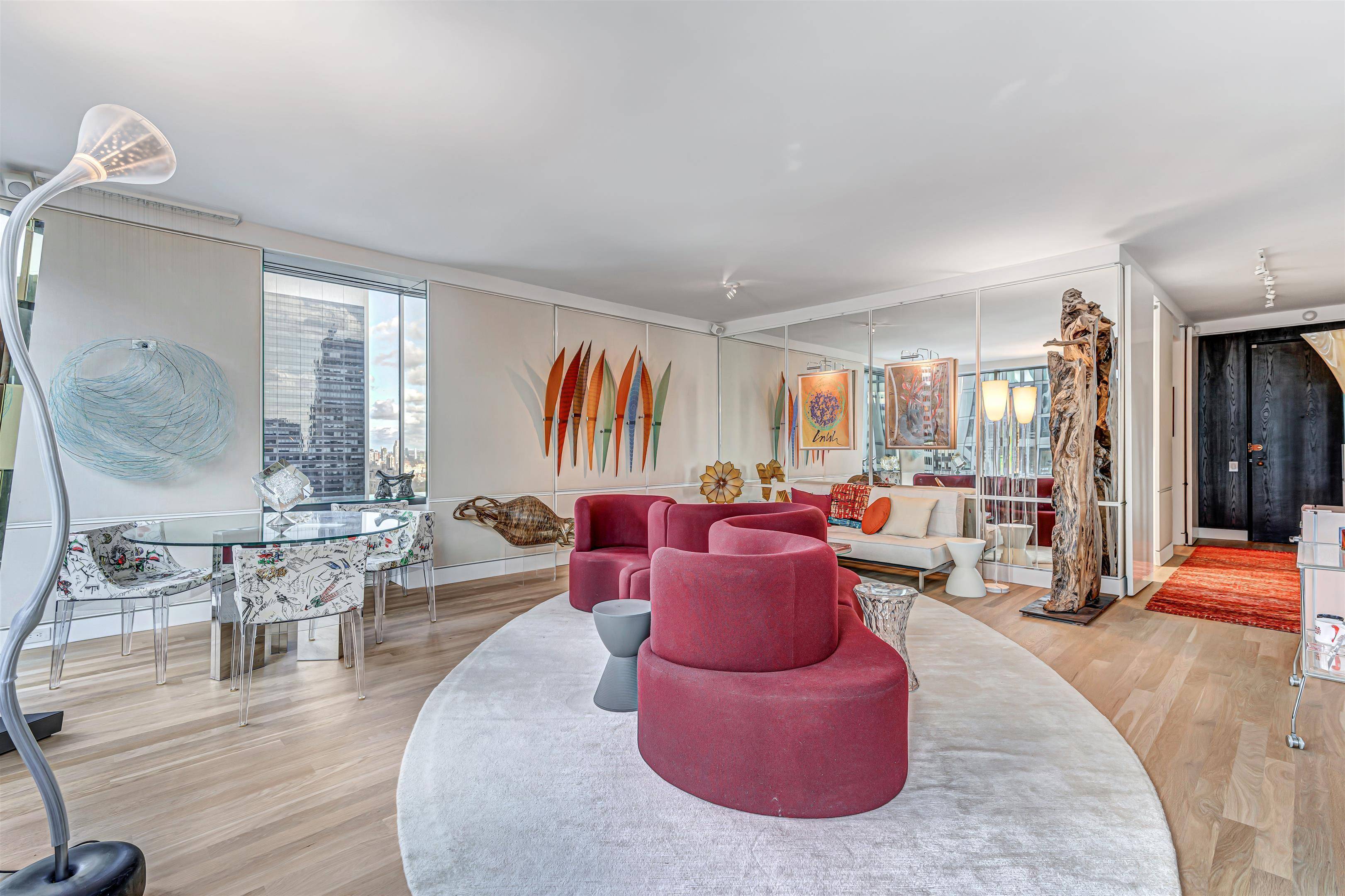 Overflowing with chic and clever design, this oversize 1 bedroom corner condo offers prime views of Central Park, the skyline, and Manhattan s glittering evening lights.