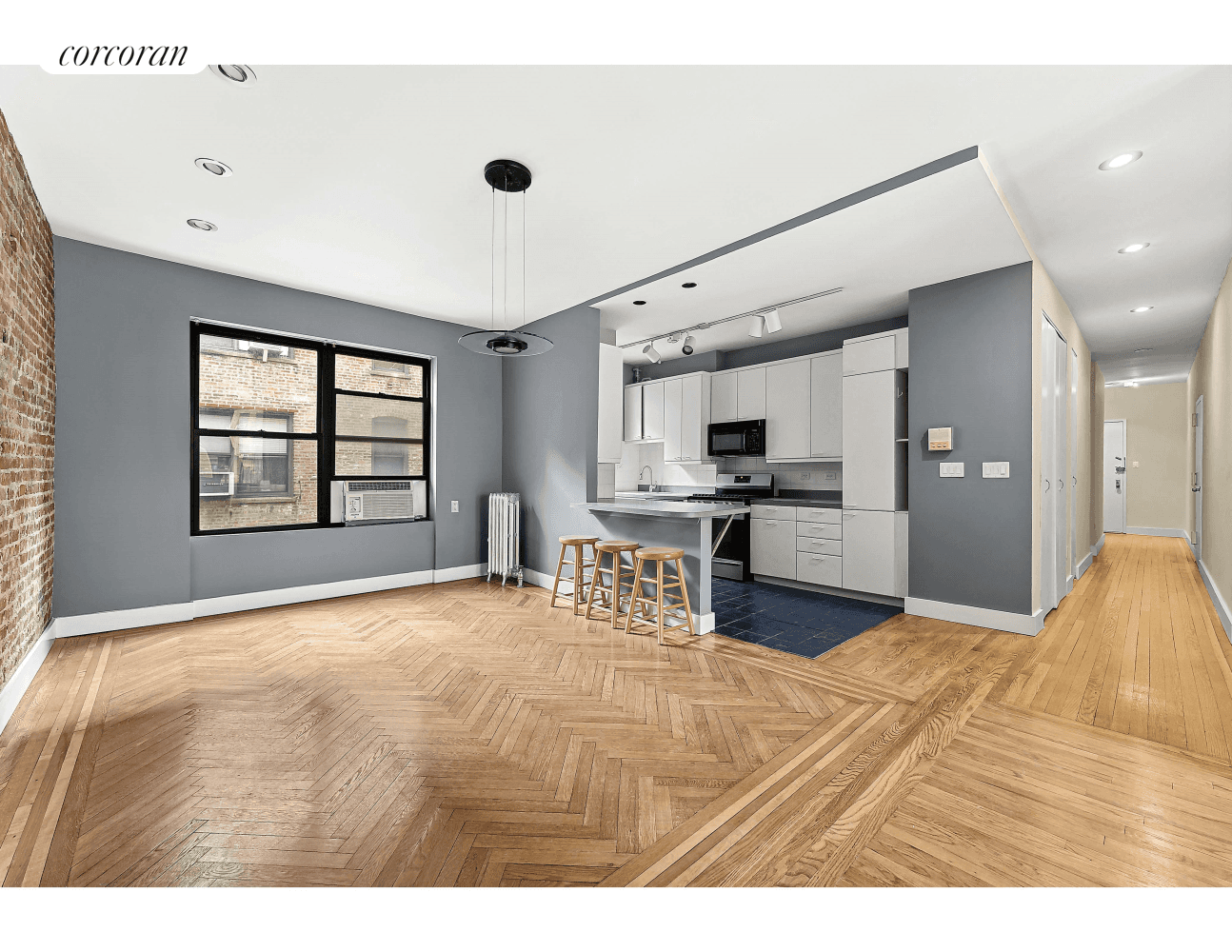 Overlooking tree filled Lafayette Plaza, next to the Hudson River, this pre war north and south facing two bedroom co op apartment has lots of light.